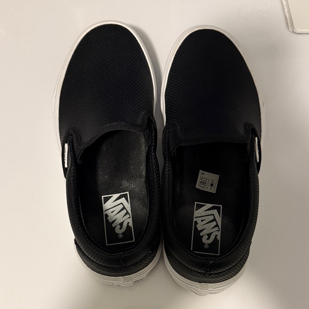 Vans Men's Black and White Slip-On Sneakers
